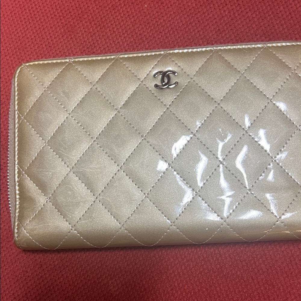 CHANEL Quilted light gold /tan patent leather wallet-